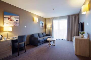 Фото номера Семейный номер-студио Отель Tristan Hotel &amp; SPA г. Конты-Рыбацке 5