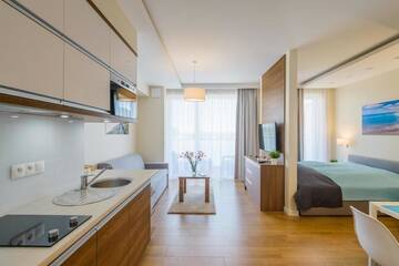 Фото номера Apartment with bedroom alcove Апартаменты Apartamenty NCNK Marina г. Конты-Рыбацке 4